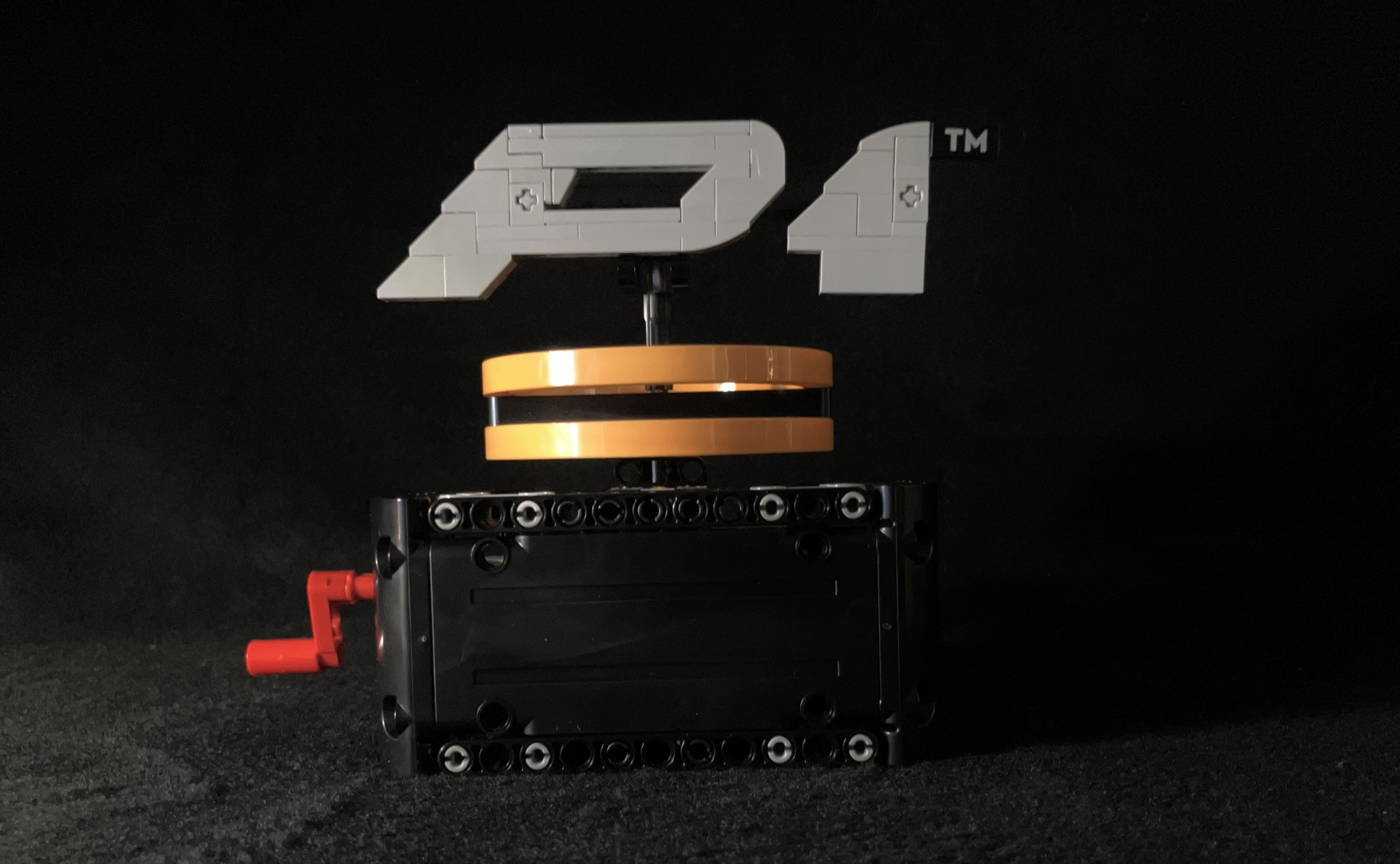 This is a free gift of a Lego Technic P1 Logo